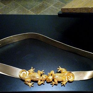 A rare vintage belt and lizard buckles